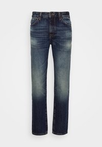 Raka blå jeans med urtvättad finish, fem fickor, bälteshällor och knappstängning i midjan.