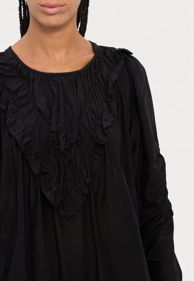 Black blouse featuring a ruffled V-neck and long sleeves with gathered detailing, made from soft fabric with a smooth texture.