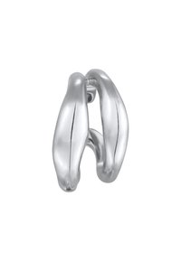 Escultura de metal plateado con un acabado suave y pulido. Presenta un diseño de doble lazo, que enfatiza las curvas y las formas orgánicas.