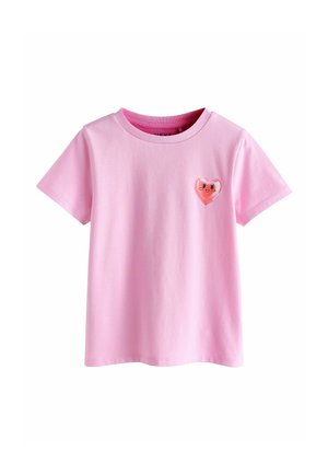 Pink short-sleeve t-shirt made of cotton, featuring a small, colorful heart graphic on the left chest area. Classic crew neck design.