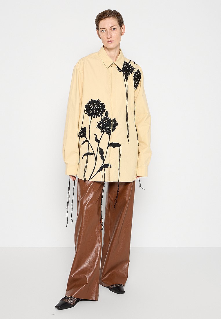 Nanushka Overhemdblouse beige Nanushka Overhemdblouse beige