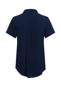 Navy short-sleeve shirt with a collar, soft fabric, back pleat detail, and rounded hem. Features a smooth texture and relaxed fit.