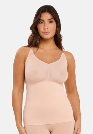 Camisole nude sans manches avec une texture lisse, décolleté en V, larges bretelles réglables et design sans coutures pour le confort et le soutien.