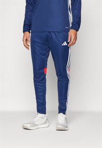 adidas Performance - TIRO 25 ESSENTIALS - Tracksuit bottoms - team navy blue/red Thumbnail Image 1