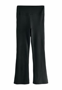 Pantalones de yoga negros acampanados hechos de un material elástico. Presentan una cintura alta y una textura suave sin patrones o acentos visibles.