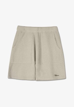 Shorts beige in spugna con due tasche frontali e una texture morbida. Presentano un orlo leggermente sfilacciato e un logo del marchio ricamato in basso a destra.