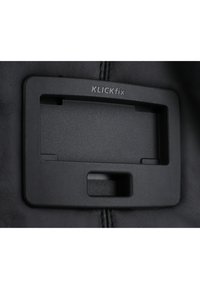 KLICKfix bracket, rectangular black plastic, features a slot for mounting and a circular cutout, textured surface for grip, secure attachment design.