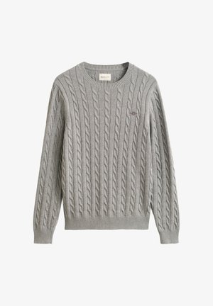 Siv pulover iz pletenega bombaža z okroglim izrezom, rebrastimi manšetami in spodnjim robom. Subtilno vezen logotip na prsih. Iz mehkega materiala.