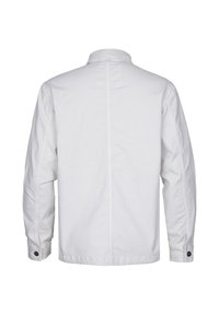 White jacket with a stand collar, long sleeves, and rear seam detailing. Made of smooth fabric with button accents at the cuffs.