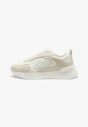 White sneaker featuring a combination of smooth leather and suede, rounded toe, flat laces, subtle logo on the side, and cushioned sole.