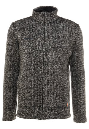 Gebreide ritsjack in zwart en grijs met een gestructureerd patroon, hoge kraag en subtiele oranje accent nabij de zoom.