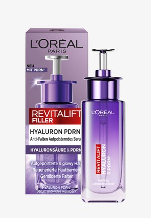Siero anti-rughe L'Oréal Paris Revitalift Filler Hyaluron PDRN con flacone con pompa viola e scatola del prodotto viola coordinata.