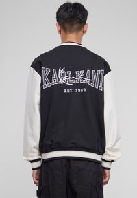 Karl Kani - COLLEGE  - Bomberjacke - schwarz ecru Thumbnail-Bild 1