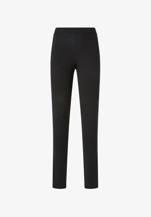 Leggings noirs en tissu extensible, présentant une texture lisse et une coupe ajustée, avec une taille haute et sans coutures visibles.