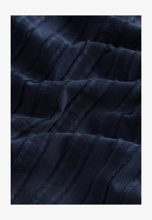 Navy fabric with textured stripes, featuring raised and flat sections. Material appears soft, with a smooth surface and subtle sheen.