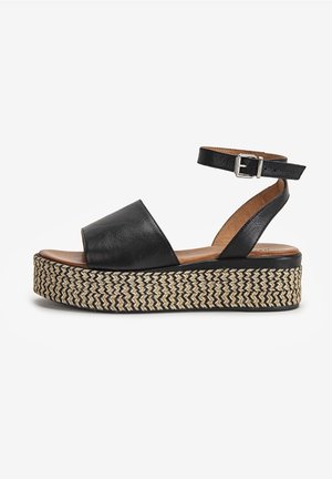 Sorte læder platform sandaler med en bred forreste rem og justerbar ankelrem, med en vævet jute hæl og gummisål.