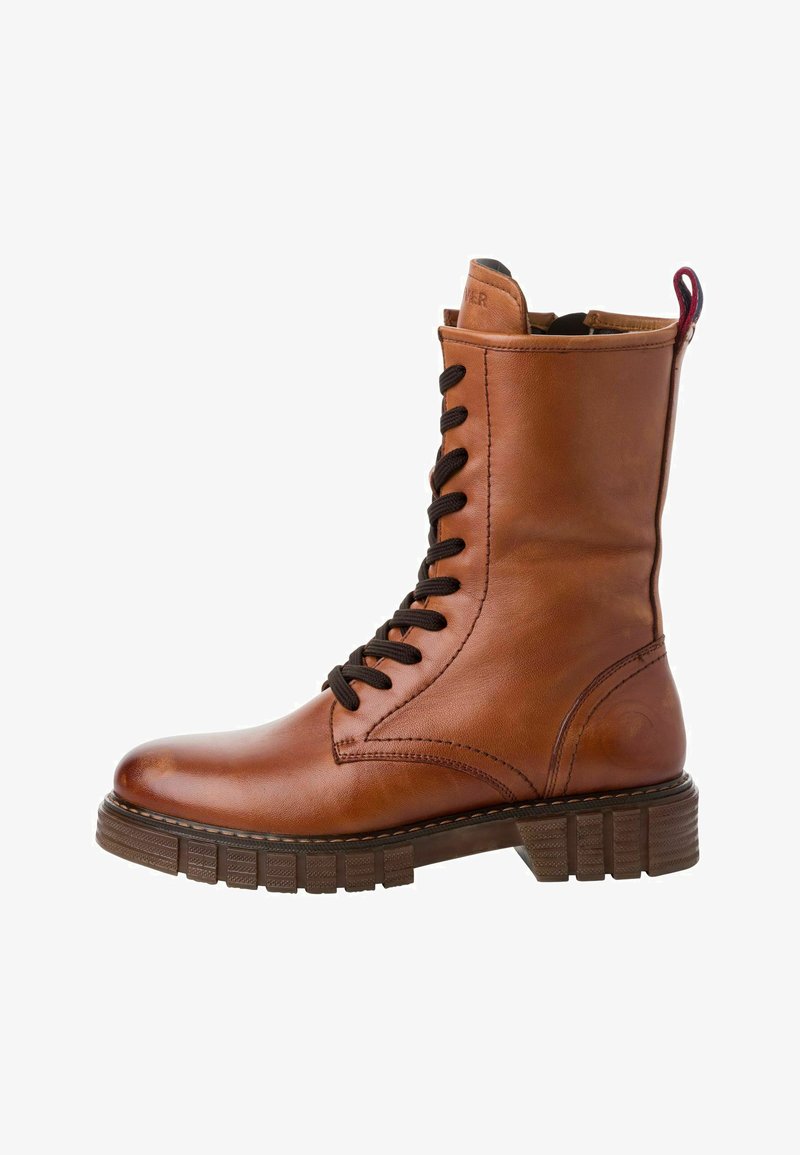 Braune Leder-Stiefelette mit schwarzen Schnürsenkeln, gepolsterter Lasche, rundem Zehenbereich und strukturiertem Gummisohle mit blockartigen Rillen.
