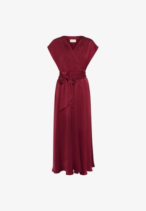 Burgundy wrap dress in satin with short sleeves, a deep V-neck, and a tied waist belt, featuring a flowing floor-length skirt.