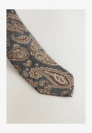 Marineblauer Krawatte mit Paisleymuster in Braun-, Creme- und Goldtönen. Strukturiertes Gewebe mit spitzem Ende, das aufwendige Details zeigt.