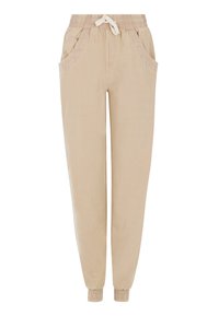 Beige Jogginghose mit Kordelzugbund, elastischen Bündchen und seitlichen Taschen, aus leichtem Stoff mit glatter Textur.