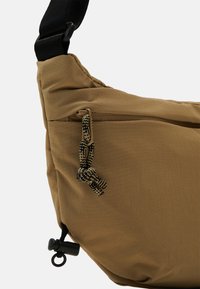 The North Face NEVER STOP CROSSBODY UNISEX - Borsa a tracolla - tan/black