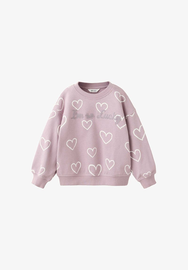 Sweat-shirt violet clair avec motifs de cœurs blancs et texte pailleté argenté affichant "I am so lucky" sur la poitrine.