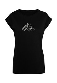 Zwarte korte mouwen t-shirt met een witte bergafbeelding. De stof lijkt glad en heeft een losse pasvorm met een ronde halslijn.