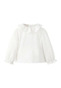 Witte blouse met lange mouwen, een gerimpelde kraag, textuurstof en gerimpelde manchetten. Subtiel bloemenpatroon overal.