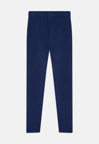 Marineblå leggings laget av myk, elastisk tekstil. Har en elastisk midje, smal passform, og ingen synlige mønstre eller detaljer.