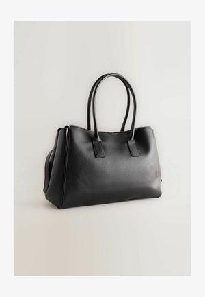 Black faux leather tote bag with dual long handles, structured shape, smooth texture, and minimalistic design. No visible hardware or accents.