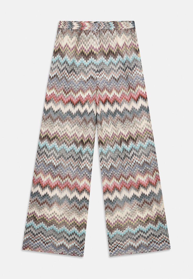 Bredde bukser med et zigzag-mønster i forskjellige farger inkludert krem, blå, rød, og grå. Laget av et strukturert stoff.