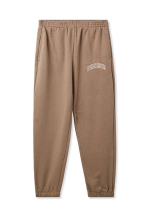 Pantaloni della tuta marroni realizzati in morbido tessuto, con cintura elastica, caviglie a costine e ricamo bianco "PHOENIX" sulla coscia sinistra.