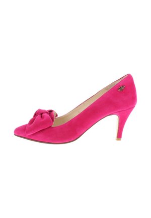 Knallpinker Wildleder-Pumps mit mittelhohem Absatz, großer Schleifendetail an der Spitze und einer kleinen metallenen Blumenverzierung in der Nähe der Ferse.