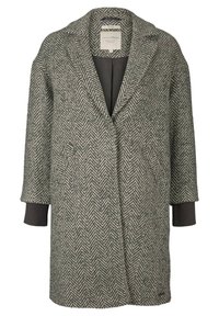 Cappotto a motivi a spina di pesce grigio e beige, con colletto a revers, apertura frontale e maniche scure a contrasto. Tessuto morbido e texture.