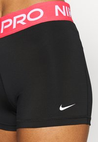 Nike Performance SHORT - Leggings - black/archaeo pink/white
