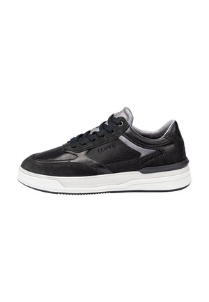 Black leather and suede sneakers with gray accents, cushioned collar, round toe, and white rubber sole featuring textured tread pattern.