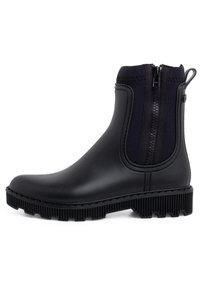 Botas de tobillo impermeables negras con un upper de goma suave, paneles laterales elásticos, cierre de cremallera y una suela robusta y texturizada.