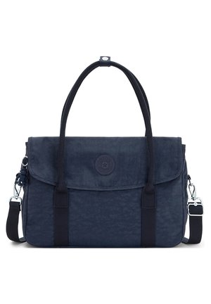 Sac à main en tissu bleu marine avec fermeture à rabat, deux poignées, bandoulière réglable et logo de marque circulaire au centre avant.