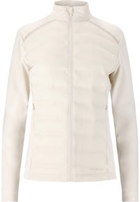 Ljust beige jacka med dragkedja fram, vadderad kropp och släta ärmar. Har en hög krage och diskret branding vid fållen.