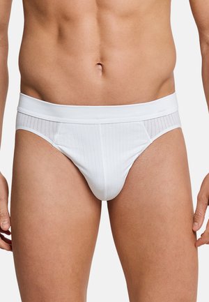 Weiße kurze Unterwäsche mit einem glatten Taillenbund und einem dezenten vertikalen Streifenmuster auf dem Stoff. Elastisches Material mit passgenauem Sitz.