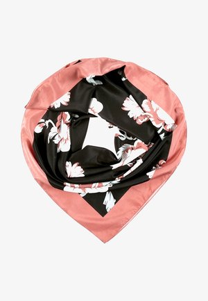 Foulard carré en soie avec un centre noir et un motif floral blanc, bordé d'une large bordure rose poudré, plié librement en forme circulaire.
