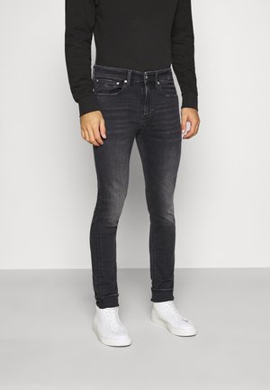Vaqueros pitillo - black denim