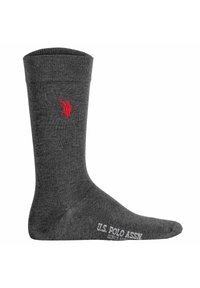 Grå bomuldscrew sok med ribbet tekstur og et rødt broderet logo. Har forstærket hæl og tå, med "U.S. POLO ASSN" trykt nederst.
