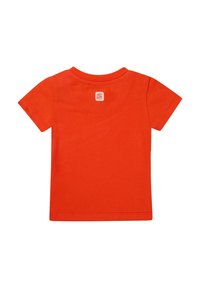 Korte mouwen oranje katoenen T-shirt met een ronde hals. Bevat een klein label op de achterkant en heeft een effen textuur.