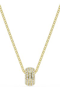 Złoty naszyjnik łańcuszkowy z cylindrycznym wisiorkiem ozdobionym przezroczystymi kryształami, podkreślającym teksturowaną powierzchnię i refleksyjne akcenty.