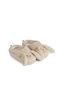 Beige plyschtofflor med floppy öron, rund tåform och ljusbruna accenter. Har en mjuk textur och en minimalistisk djuransiktsdesign.