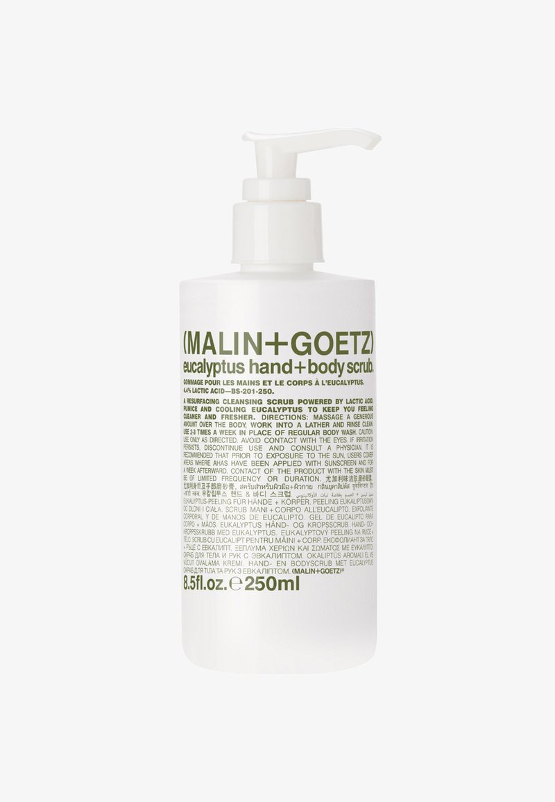 Weiße zylindrische Flasche mit Pumpspender. Das Etikett zeigt grüne Schrift, die die Anwendung des Produkts beschreibt. Enthält 250 ml Eukalyptus-Hand- und Körperpeeling.