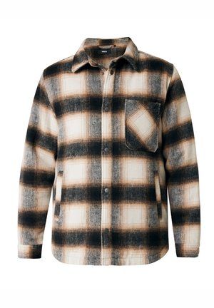 Zwart en beige geruite flanellen shirt met een borstzak, knoopsluitingen en een kraag; heeft een zachte textuur en scherpe lijnen in het patroon.
