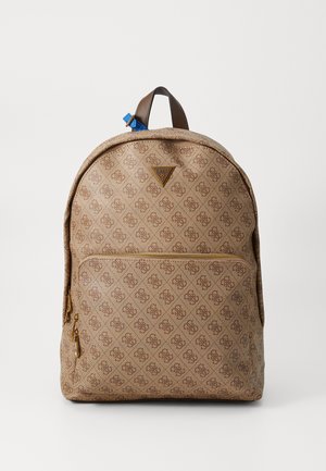 Tan värvi seljakott korduvate logo mustritega, pruunist nahast detailid, lukuga eesmine tasku ja sinine rihma detail ülaosas.