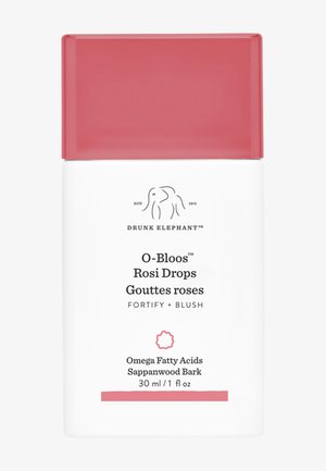 Weißer Behälter mit rosa Kappe, beschriftet mit "O-Bloos Rosy Drops" und Produktdetails. Auffällige Markenkennzeichnung sichtbar, minimalistisches Design.
